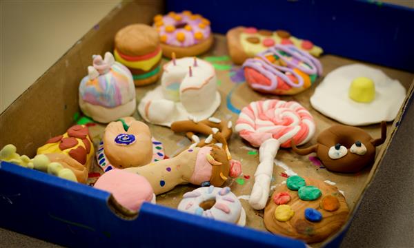 Array of food models made from clay